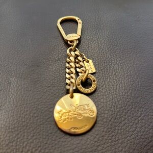 Coach gold handbag charm